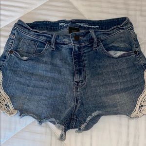 Denim shorts with lace trim